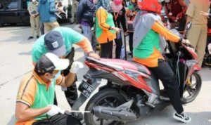 Denda tilang terkait uji emisi yang tak lolos