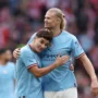 Duo Manchester City, Julian Alvarez dan Erling Haaland tengah menjadi incaran Real Madrid.