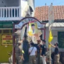 Koordinator Divisi Hukum, Pencegahan, Partisipasi Masyarakat dan Hubungan Masyarakat Bawaslu Kota Cirebon Nurul Fajri memantau jalannya penertiban. (JE / Ayu )