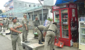 Ilustrasi: Penertiban PKL oleh Satpol PP Kota Depok.