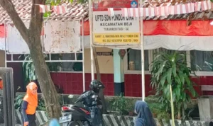 Plang nama SD Negeri Pondok Cina 1 Kota Depok