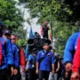Ilustrasi: Para buruh berdemo menuntut kenaikan UMK Kota Bandung tahun 2024.