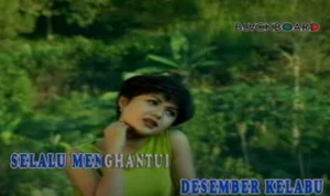 Lirik Lagu Desember Kelabu - Yuni Shara, Cocok Menyambut Datangnya Musim Hujan Lirik lagu Desember Kelabu yang dipopulerkan Yuni Shara. (youtube)