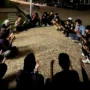 Sejumlah Mahasiswa di Cirebon menggelar deklarasi pernyataan sikap dengan memberikan dukungan dan doa kepada Firli Bahuri di Halaman Gedung Kesenian Kota Cirebon, Jawa Barat, Minggu 17 Desember 2023 malam.