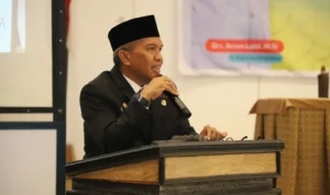 Pj Bupati Bandung Barat, Arsan Latif saat membuka sambutan di kegiatan Musrenbang. Jumat (19/1). Foto Jabarekspres