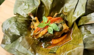 Cara membuat pepes ayam kemangi dengan bumbu rempah yang melimpah Foto: YouTube/ @Devina Hermawan