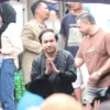 Salah satu Tokoh Muda Bogor, Aji Jaya Bintara (Tengah) saat menggelar simulasi program makan siang gratis di Kota Bogor, Senin (11/3).