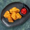 Resep Mudah Membuat Nuget Ayam yang Krispi, Cocok Sebagai Camilan Lezat (ilustrasi: Freepik)