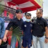 Mulyadi alias Ujang alias Ubro (31) yang lakukan penganiayaan kepada anaknya hingga meninggal dunia saat digiring pihak kepolisan dalam ungkap kasus polresta bandung di Pos Pam Terpadu Cileunyi, Kabupaten Bandung, Minggu (7/4/2024). Foto Agi Jabar Ekspres