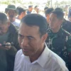 Menteri Pertanian Andi Amran Sulaiman saat melakukan kunjungan kerja di pesawahan Desa Bojongemas, Solokanjeruk, Kabupaten Bandung, Selasa (7/5/2024). Foto Agi Jabar Ekspres