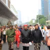 Bendera Merah Putih Membentang Sepanjang 300 Meter di Kirab Pancasila 2024