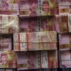 Barang bukti uang palsu saat dirilis pengungkapan mata uang palsu di Bareskrim Mabes Polri, Jakarta, Selasa (1/3/2022). Foto/ANTARA