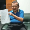 Komite Olah Raga Nasional Indonesia ( KONI ) Kota Banjar dilaporkan ke Polres Ciamis oleh H. Johnny A. Djalil Anwar.