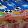 ILUSTRASI Aplikasi investasi online yang menjanjikan sebagai penghasil uang.