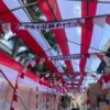 Penampakan bendera dengan panjang 70 meter yang dipasang di Jalan Galumpit, Desa Cileunyi Kulon, Kecamatan Cileunyi, Kabupaten Bandung. Foto Agi Jabar Ekspres