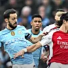 Mulai dari Susunan Pemain Man City vs Arsenal di pekan kelima Liga Premier Inggris, pertandingan berakhir dramatis dengan skor 2-2.