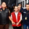 Anggota DPRD Jabar Fraksi PAN dan Eks Ketua NPCI Jabar, SG, saat diringkus Kejati.(ist)