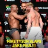Mike Tyson mengejutkan publik dengan tampar ke Jake Paul di sesi timbang badan, sehari sebelum pertarungan kontroversial di Arlington, Texas.