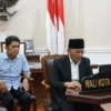 Pj Wali Kota Bogor, Hery Antasari bersama Kadiskominfo Kota Bogor. (Foto: Yudha Prananda / Istimewa)