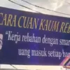 Salah satu spanduk aplikasi DBC yang dipasang di jalanan untuk promosi.