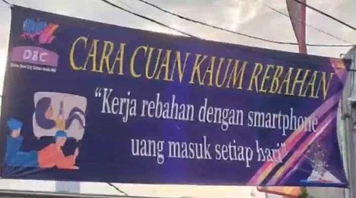 Salah satu spanduk aplikasi DBC yang dipasang di jalanan untuk promosi.