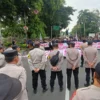 Aliansi Mahasiswa di Bogor saat menggelar aksi mengkritisi 100 hari kerja Prabowo-Gibran di Jalan Sudirman, Kota Bogor, Kamis (30/1). (Yudha Prananda / Jabar Ekspres)