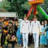Wali Kota dan Wakil Wali Kota Bogor, Dedie A. Rachim dan Jenal Mutaqin disambut antusias warga saat tiba di Plaza Balai Kota Bogor. (Foto: Diskominfo Kota Bogor)