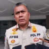 Kasatpol PP Kabupaten Bogor, Cecep Imam Nagarasid saat memberikan keterangan kepada awak media di Kompleks Kantor Bupati, Cibinong, Kabupaten Bogor, pada Selasa (11/2). Foto : Regi / Jabar Ekspres