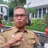 Kadisdukcapil Kabupaten Bogor, Hadijana saat ditemui oleh awak media di Kompleks Kantor Bupati, Cibinong, Kabupaten Bogor, pada Selasa (11/2). Foto : Regi