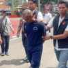 Tampang pelaku AF yang tega bunuh NA (27) saat digiring kepolisian di Mapolresta Bandung, Soreang, Kabupaten Bandung, Rabu (19/2). Foto Agi/Jabar Ekspres/