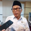 Ketua DPRD Jabar Buky Wibawa saat menyampaikan dukungan program pemutihan pajak.