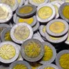 Keunikan uang Rp 1.000 kelapa sawit yang bikin mahal terletak pada desainnya yang ikonik dan jumlah peredarannya yang kini makin langka
