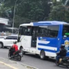Ilustrasi: Bus MJT melintasi kawasan Viaduct di Kota Bandung, Rabu (14/5). Foto: Dimas Rachmatsyah / Jabar Ekspres
