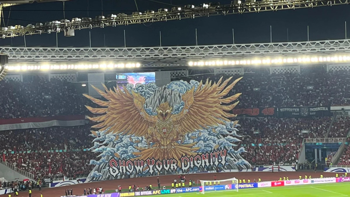 Aksi suporter Timnas Indonesai saat menghadapi Bahrain Maret lalu/Foto: Hari Priyadi/Jabar Ekspres/