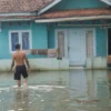 Ilustrasi: Genangan banjir di perumahan warga di Kota Bandung beberapa waktu lalu. Foto: Dimas Rachmatsyah / Jabar Ekspres