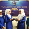Ketua TP PKK Kota Bogor, Yantie Rachim (Kedua Kiri) saat menghadiri tasyakuran HUT ke-73 POW Kota Bogor, Selasa (10/6). (Yudha Prananda / Istimewa)