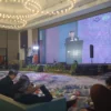 Ketua ABPPTSI Jawa Barat, Dr. Ricky Agusiady saat sambutan dalam Rakernas III ABPPTSI yang mengusung tema Implementasi Perubahan Paradigma dan Transformasi PTSI di di Hotel Pullman, Kota Bandung, Rabu, 16 Juli 2025.