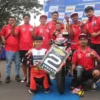 Ilustrasi pebalap muda Agam Abdillah dari tim Honda Daya Jayadi Racing Team saat meraih juara kedua di Kejurnas Motoprix 2025 Region B di Surabaya.