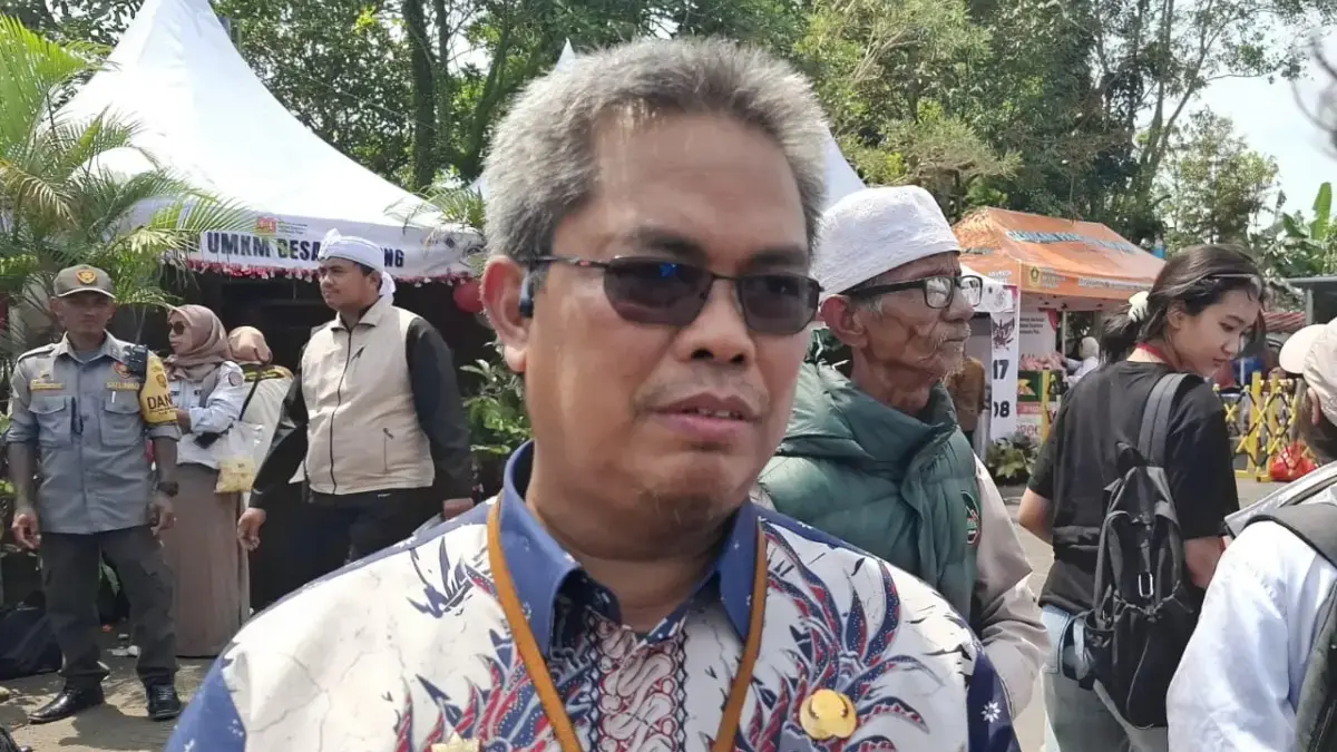 Kepala Disdukcapil Kabupaten Bogor Hadijana saat ditemui di Kecamatan Cijeruk, pada Kamis (7/8/2025). Foto: Re