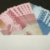 ILUSTRASI bantuan DANA gratis hingga Rp900.000 yang bakal cair September 2025 ini.