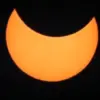 Penampakan matahari di Aceh yang hampir setengahnya telah tertutup bulan.