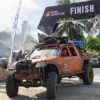 Foto Utama : Salah satu peserta DFC4 kategori Ekspedisi saat memasuki garis finish di Kampung Turis