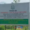 Plang sitaan Kejaksaan Agung pada salah satu lahan di Desa Sukaharja, Kabupaten Bogor. Foto: Regi