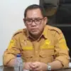 Kades Cikuda, Kecamatan Parung Panjang, Kabupaten Bogor, R Agus Sutisna (RAS) yang ditangkap karena diduga mel