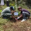 Penanaman pohon untuk reboisasi pada program Telkom Employee Social Activity (TESA) di Desa Tegallega, Cianjur