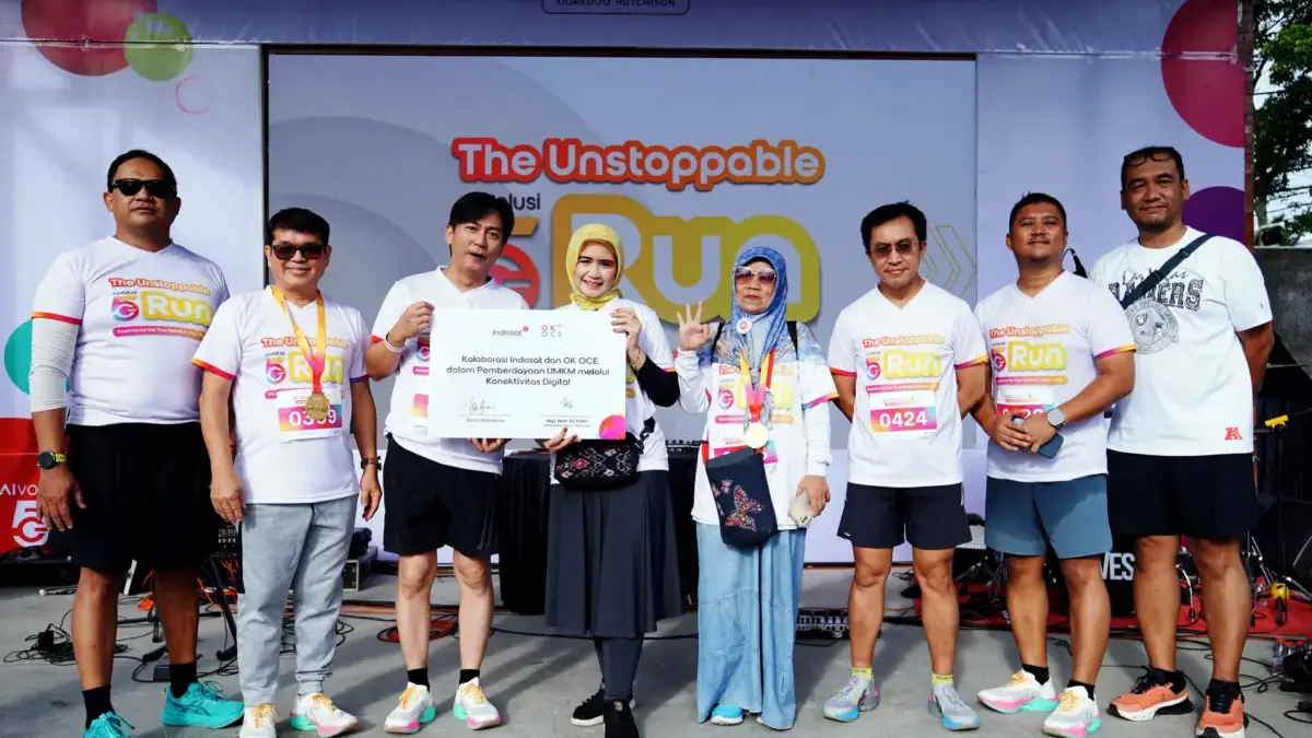 gelaran The Unstoppable AIvolusi5G Run di Kiara Artha Park, Minggu (15/2/2026). 
