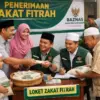 Ilustrasi: Masyarakat saat membayar zakat fitrah. Dok GPT AI