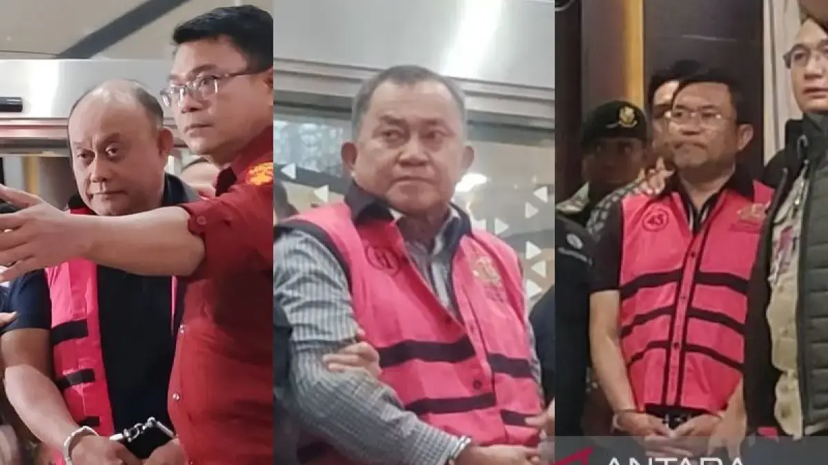 Petugas Kejaksaan Agung menggiring mantan Kepala Badan Gizi Nasional (BGN), Dadan Hindayana (DH), menuju mobil