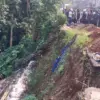 Area terdampak longsor di Jalan Kebon Pedes, Kota Bogor, yang mulai dilakukan penanganan pada Rabu (17/6/2026)