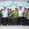 Sebanyak 60 pengurus DMI Kota Banjar periode 2026-2031 berfoto bersama jajaran pejabat, usai dilantik Minggu (
